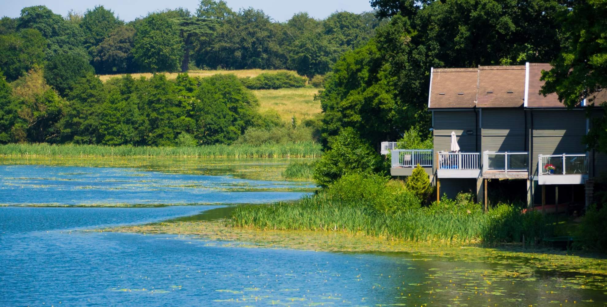 An image of a lodge for sale on the Overstone Park Resort lake